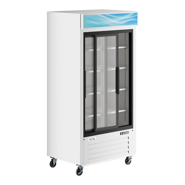 A white sliding glass door merchandiser refrigerator with LED lighting and customizable signage.