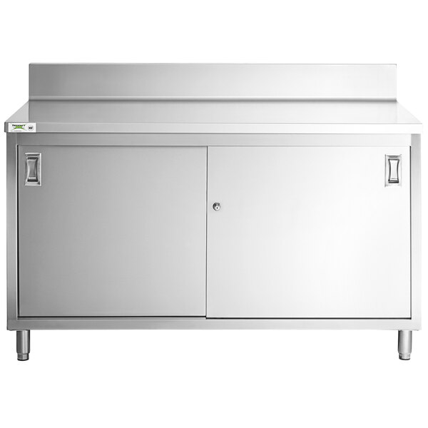 A stainless steel enclosed base table with sliding doors.