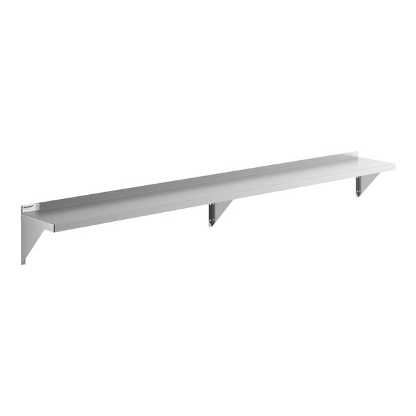 A long, stainless steel wall-mounted shelf with three supporting brackets.