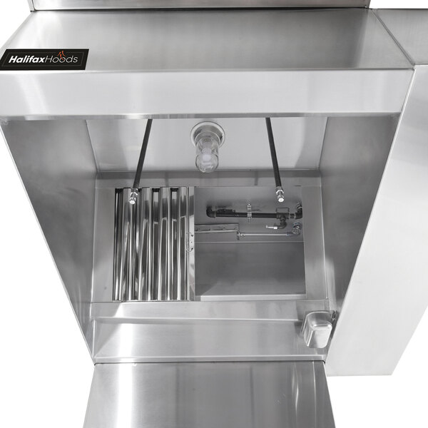 A stainless steel Halifax commercial kitchen hood with pipes and valves.