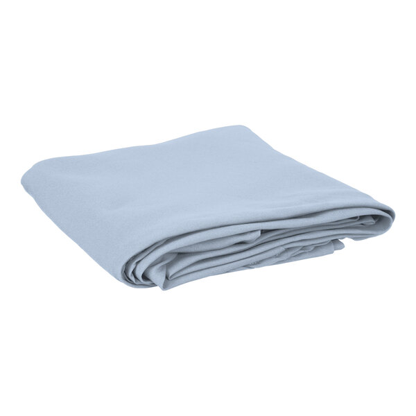 A folded light blue Intedge table cover.