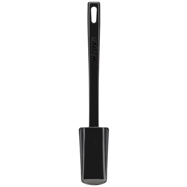 A black rectangular spatula with a handle.