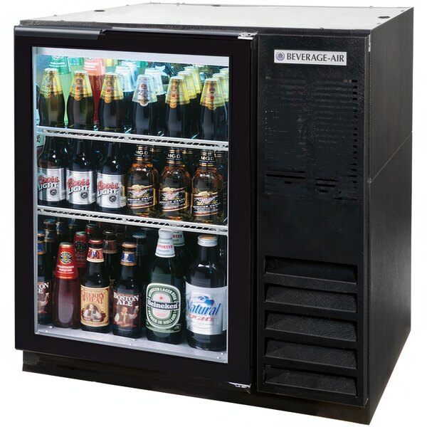 A black Beverage-Air back bar refrigerator filled with beer bottles.