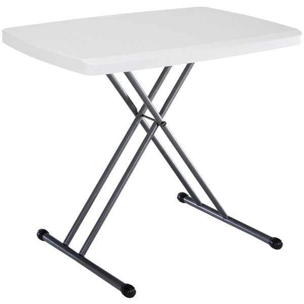 A white rectangular Lifetime personal folding table with metal legs.