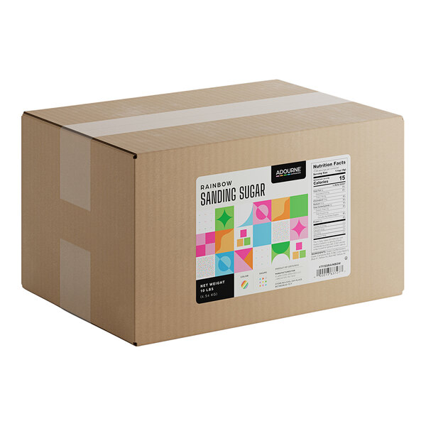 A large cardboard box labeled as containing 10 pounds of Adourne Fine Rainbow Sanding Sugar.