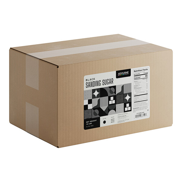 A large cardboard box labeled as containing 10 pounds of Adourne fine black sanding sugar.