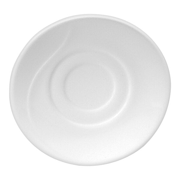 A round, white saucer with subtle embossed circular patterns.