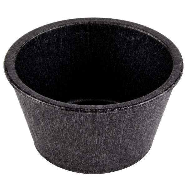 A black polyethylene ramekin with a white background.