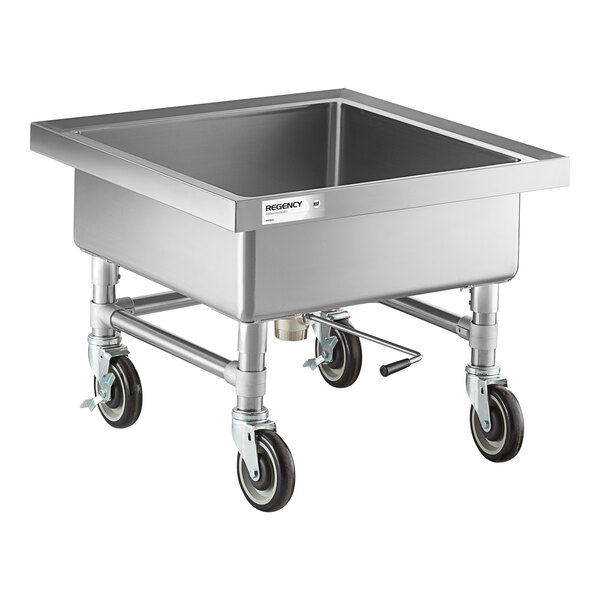 A stainless steel mobile soaking sink with four caster wheels and a deep square basin.