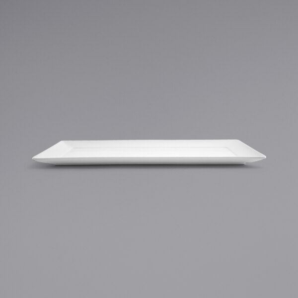 A white rectangular plate on a gray background.