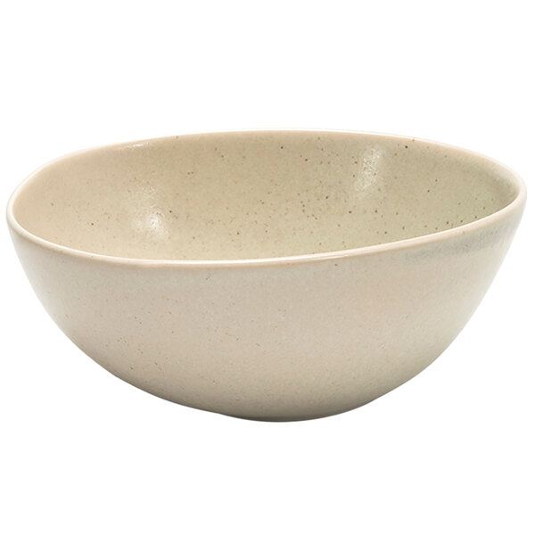 A white bowl with specks.