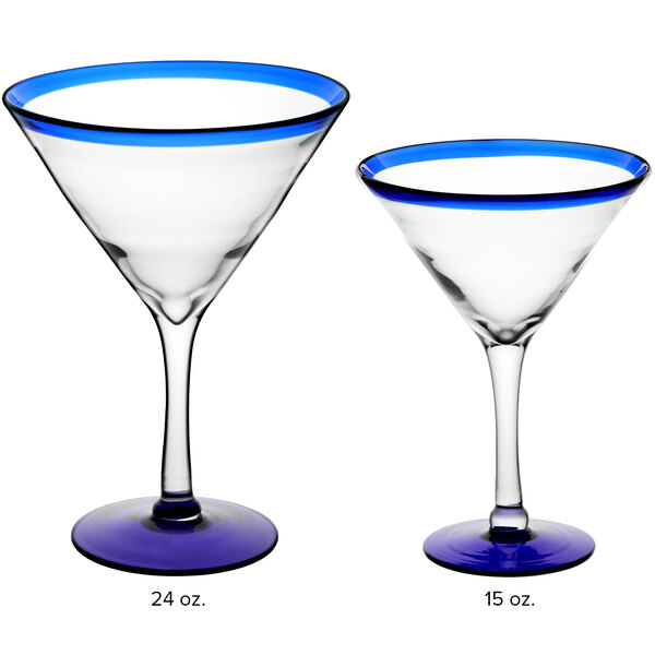 Two Acopa martini glasses with blue rims and bases.