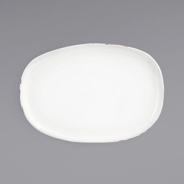a white plate with red edges