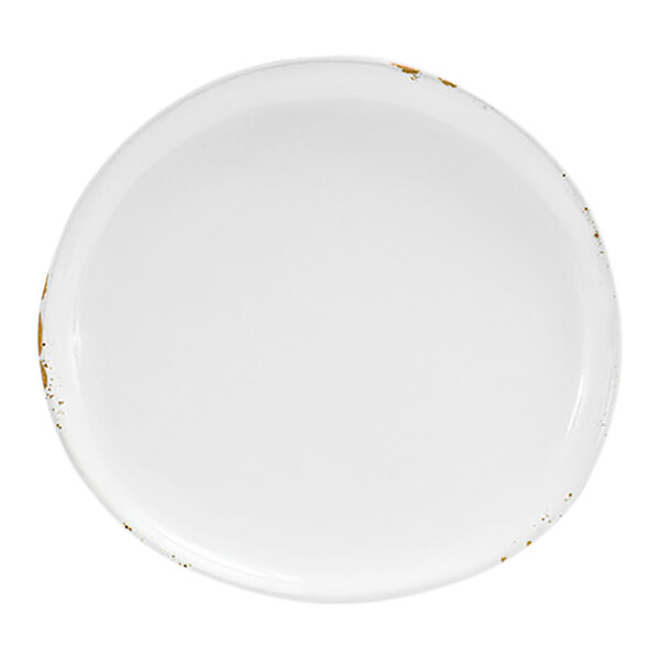 A round, superwhite porcelain plate with slight rustic detailing on the rim.