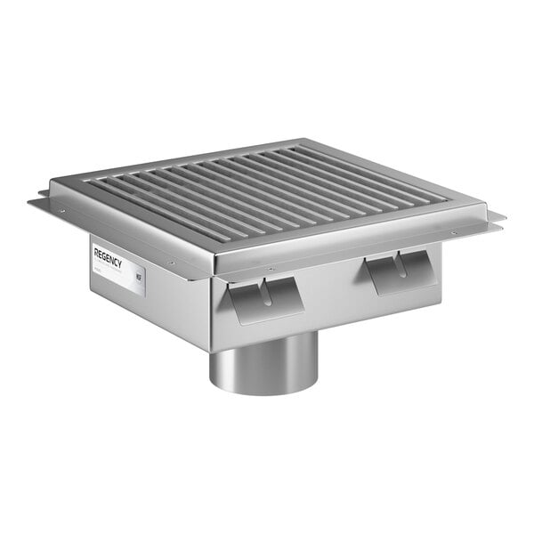 A square stainless steel floor sink with a removable grate and a central drain outlet.