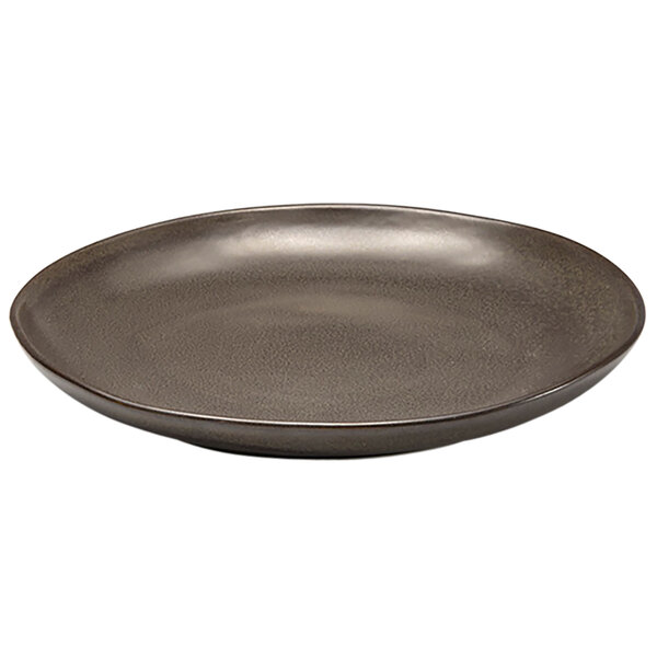 A brown Front of the House Kiln porcelain plate with a rim.