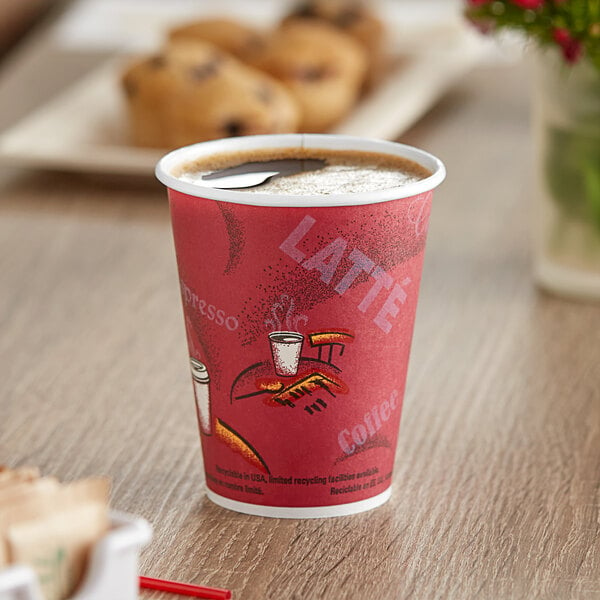 A Solo Bistro paper hot cup filled with coffee with a lid on it.