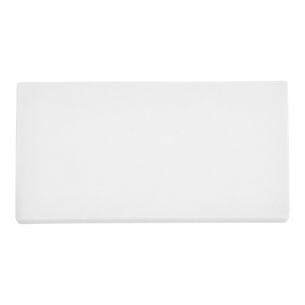 A white rectangular Vollrath cutting board.