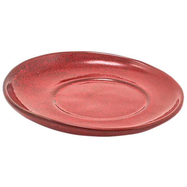 A red Front of the House porcelain saucer with a small hole in the middle.