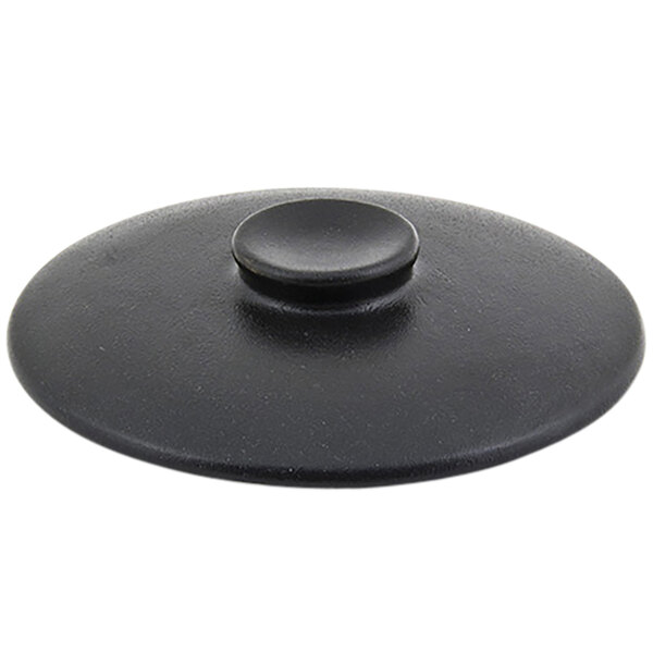 A black round stoneware lid with a round button.