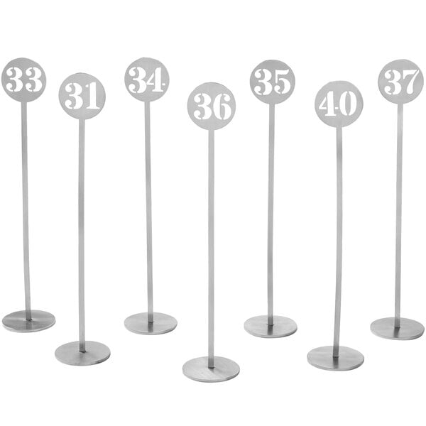 American Metalcraft silver stamped-out number table stands with numbers 31 to 40.