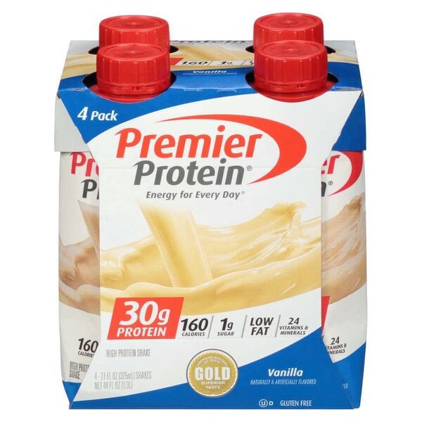 A case of 12 Premier Protein Vanilla Protein Shakes with a red plastic bottle cap.