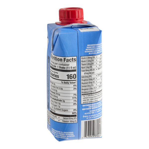 A blue 11 fl. oz. carton of Premier Protein Vanilla Protein Shake with a red cap.