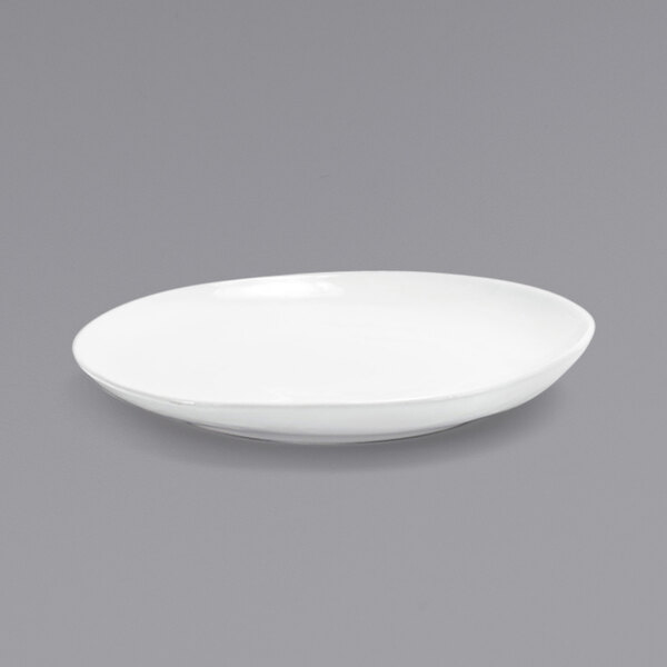 a white plate on a gray background