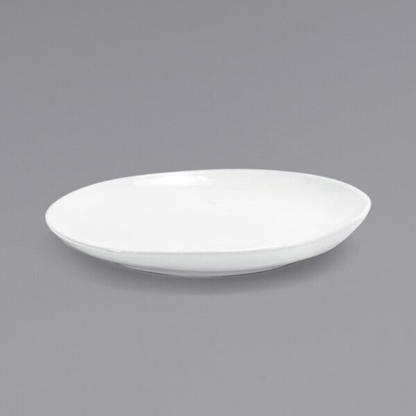A white plate with a rim on a white background.