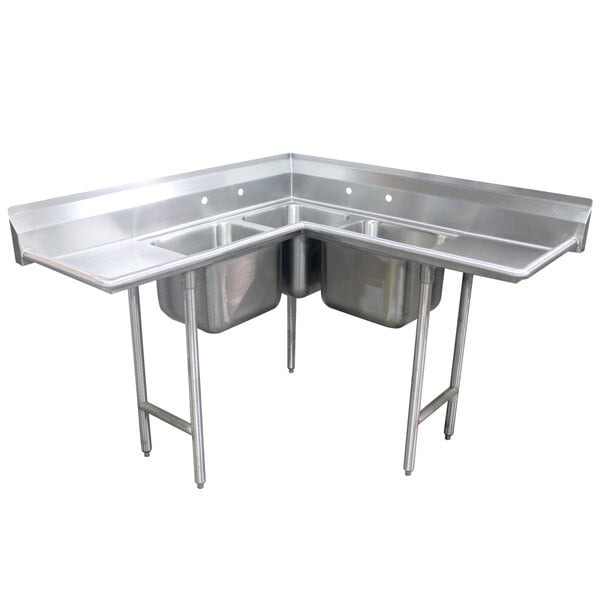 A stainless steel Advance Tabco three compartment sink with two drainboards.