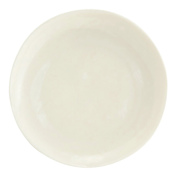 A round, plain, off-white porcelain plate.