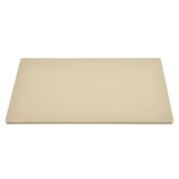 A brown rectangular cutting board on a white surface.
