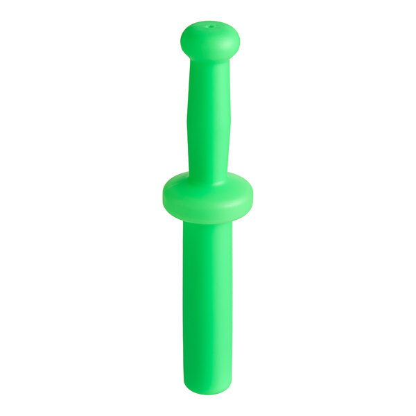 A green plastic FMP meat tamper with a handle.