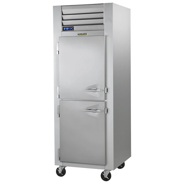 A Traulsen G Series reach-in refrigerator with left hinged half doors.