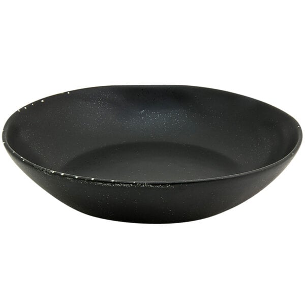 A black porcelain bowl with white specks.