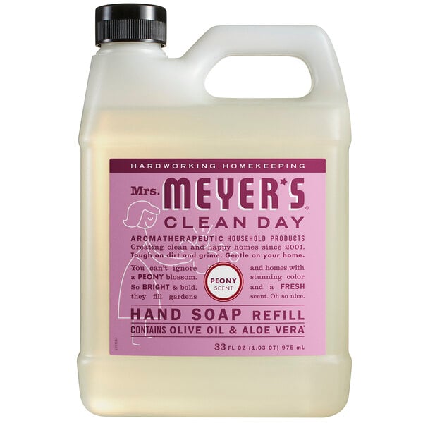 A white plastic jug of Mrs. Meyer's Clean Day Peony scented hand soap with a purple label.