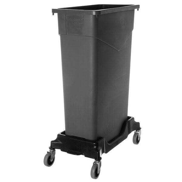 A black plastic Carlisle Trimline trash can dolly.