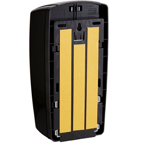 A black Rubbermaid Autofoam soap dispenser with yellow accents.