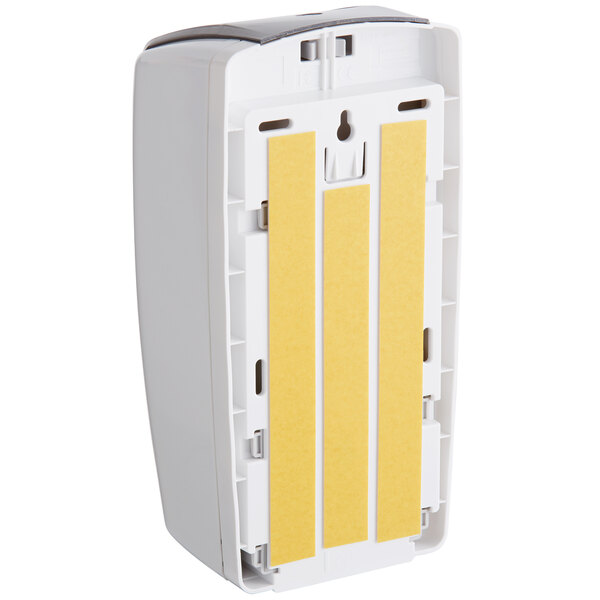 A close-up of a white Rubbermaid Lumecel automatic soap dispenser.