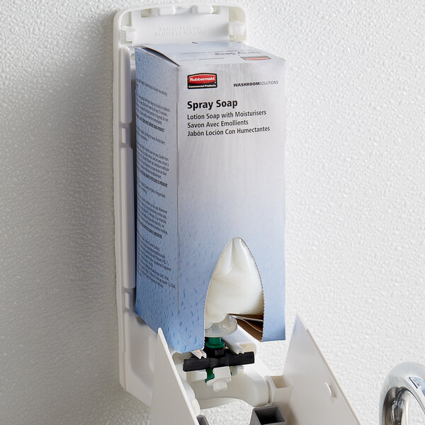 A Rubbermaid soap refill bottle attached to a manual soap dispenser.