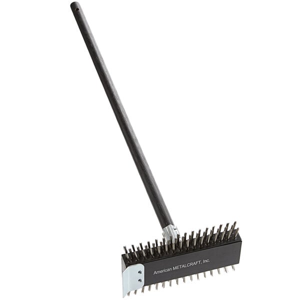 An American Metalcraft 2-sided broiler brush with a long black metal handle and silver metal brush heads.