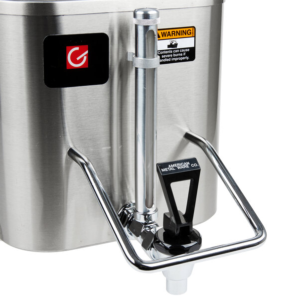 A stainless steel Grindmaster coffee shuttle with a black handle.