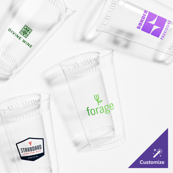 A group of clear Fabri-Kal customizable plastic cups.