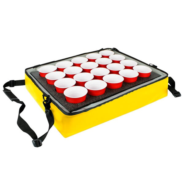 A yellow Sterno insulated drink holder with red cups inside.