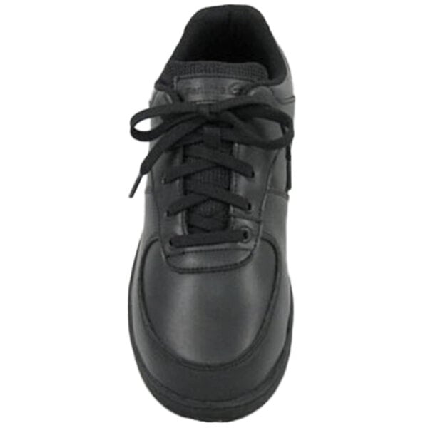 A close-up of a black Genuine Grip Women's Sport Classic shoe with laces.