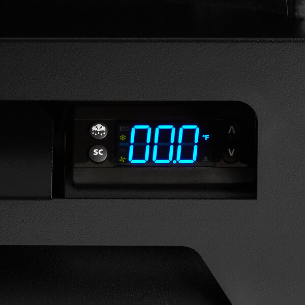 A Beverage-Air MarketMax glass door freezer with a digital temperature display.