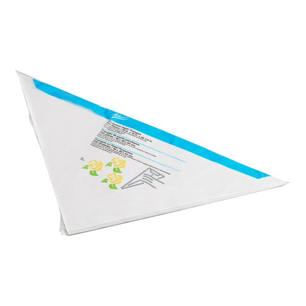 A triangular white disposable pastry bag with a blue edge and printed yellow rose designs.
