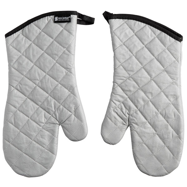 A pair of white San Jamar oven mitts with black trim.