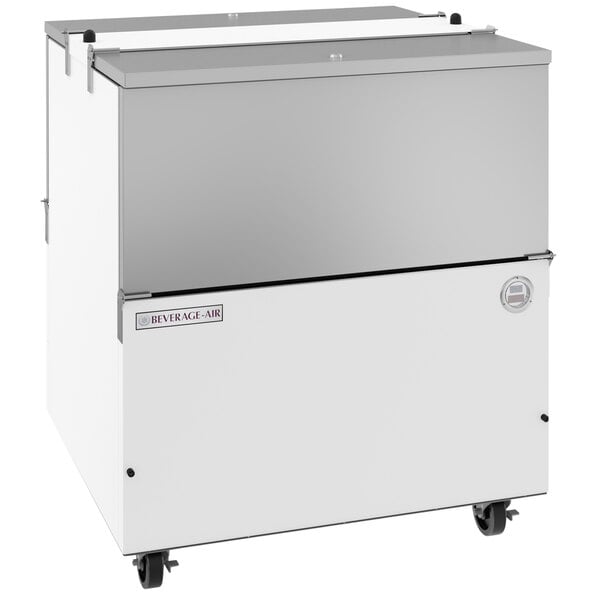 A white Beverage-Air milk cooler with stainless steel interior and wheels.