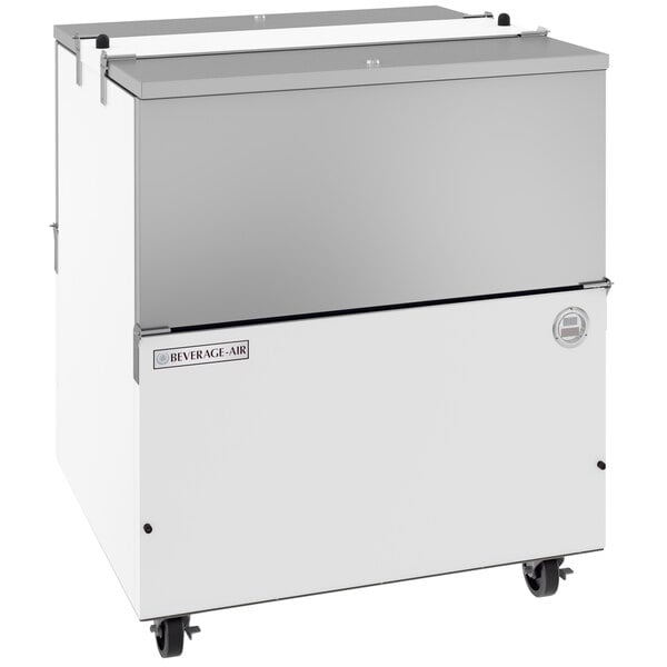 A white Beverage-Air milk cooler on wheels.